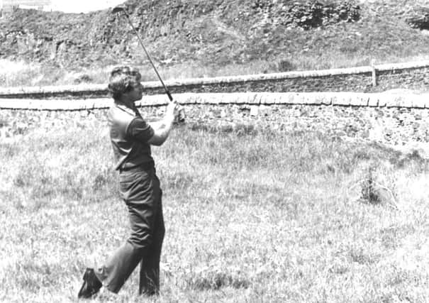 Tom Watson plays Turnberrys famous ninth hole in the 1977 Open. Changes to the hole are being considered by Donald Trump