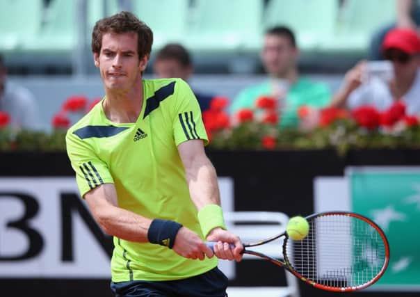 Andy Murray plays a backhand against Jurgen Melzer. Picture: Getty Images