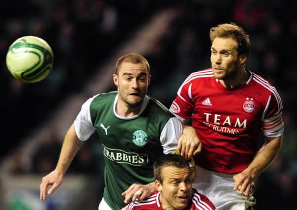 Russell Anderson, right, is pleased Aberdeen recognised his experience with new deal. Picture: Robert Perry