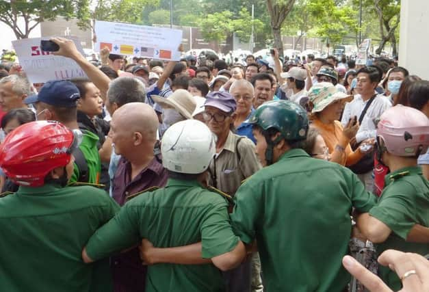 Police halt a march on the Chinese embassy. Picture: Kyodo/Reuters