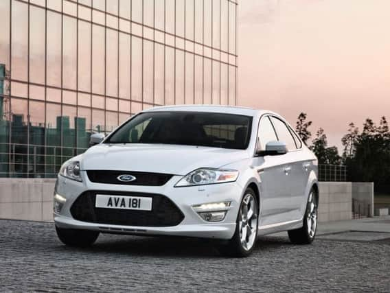 Mondeo Man in reverse as city cars dominate