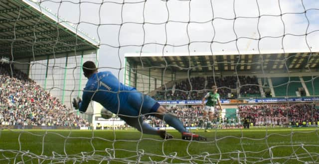 Kevin Cuthbert saves from Jasdon Cummings in the shoot out.Picture: SNS