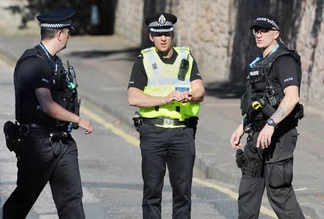 A man died after being found seriously injured in a close in Greenock, Inverclyde. Picture: Neil Hanna