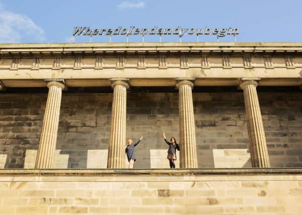 Sorcha Carey, Edinburgh Art Festival director, and Vidya Shivadas, EAF curator in front of Shilpa Gupta's neon piece, Wheredoiendandyoubegin. Picture: Malcolm McCurrach