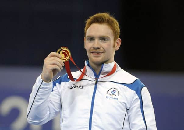 Daniel Purvis of Scotland wins parallel bars gold. Picture: John Devlin