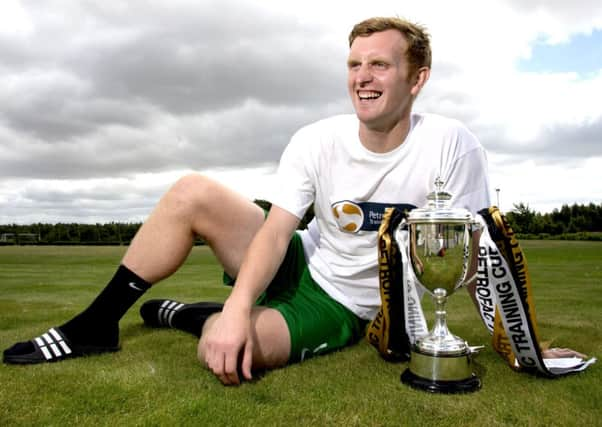 Not so long ago Liam Craigs future at Easter Road appeared in doubt, but now the midfielder will lead Hibs out at Ibrox. Picture: Rob Casey/SNS