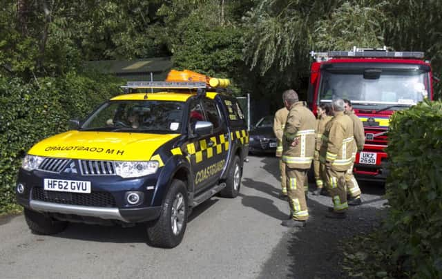 Members of the Coastguard leave the area close to the East Down Yacht Club, Killyleagh. Picture: PA