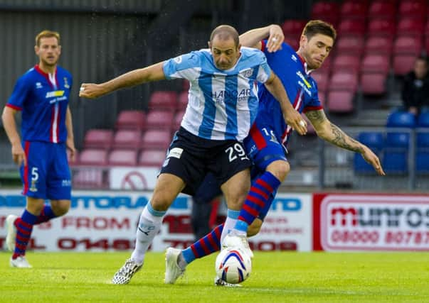 Dundee's Gary Harkins (left) and Greg Tansey battle for possession. Picture: SNS