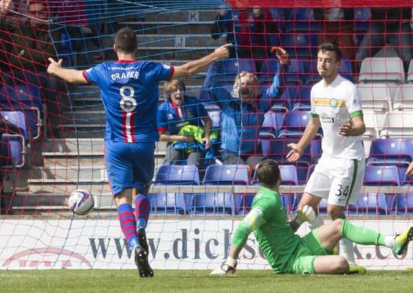 Ross Draper celebrates after Celtic's Eoghan O'Connell puts the ball in his own goal. Picture: PA