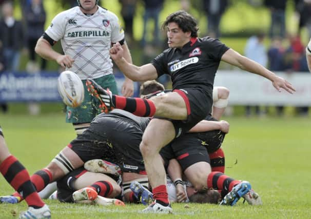 Edinburgh scrum half Sam Hidalgo-Clyne clears during his sides defeat in Melrose. Picture: Ian Rutherford