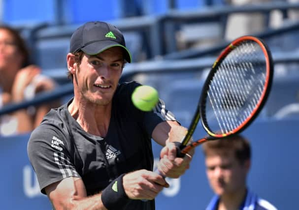 Andy Murray looked in a lot of pain yesterday as he defeated Robin Haase in the first round. Picture: Getty