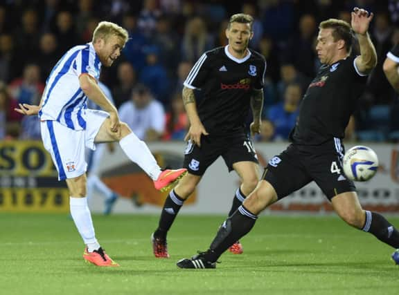 Rory McKenzie fires in Kilmarnocks winning goal in the Ayrshire derby league cup tie at Rugby Park last night. Picture: SNS