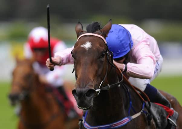 Ryan Moore and Brown Diamond on their  way to victory in the The Squire Furneaux Volvo Maiden Fillies Stakes at Sandown yesterday. Picture: Getty