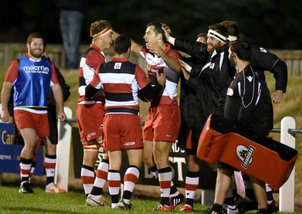 Tim Visser, third from left, celebrates his second try for Edinburgh during their pre-season friendly win over Newcastle. Picture: SNS Group/SRU