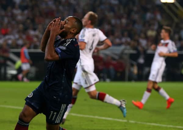 Scotland's Ikechi Anya celebrates scoring against Germany. Picture: PA