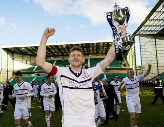 Raith Rovers captain Jason Thomson celebrates victory in last years Challenge Cup final. Picture: SNS