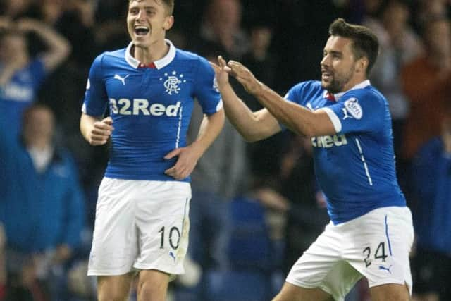 Lewis MacLeod, with Darren McGregor (right), celebrates the winning goal. Picture: PA