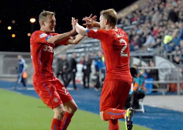 Dean Shiels (left) hails Steven Smith for his part in leveller. Picture: SNS