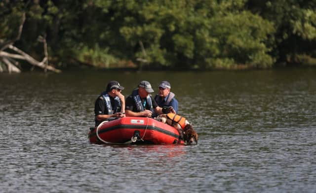 Police units pictured during the search for Alice Gross. Picture: PA