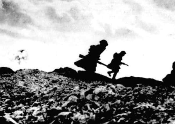 Scottish troops advance on a battlefield near Arras, France. A new documentary following PoWs from the Outer Hebrides will be shown on the BBC. Picture: Getty/Hulton Archive