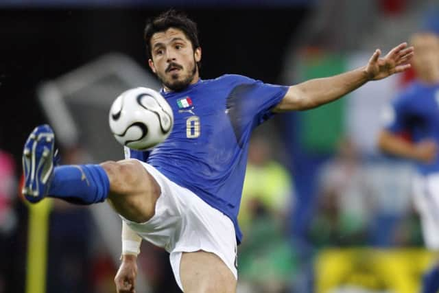 Gennaro Gattuso, pictured playing for Italy, has decided to stay on as coach. Picture: Getty