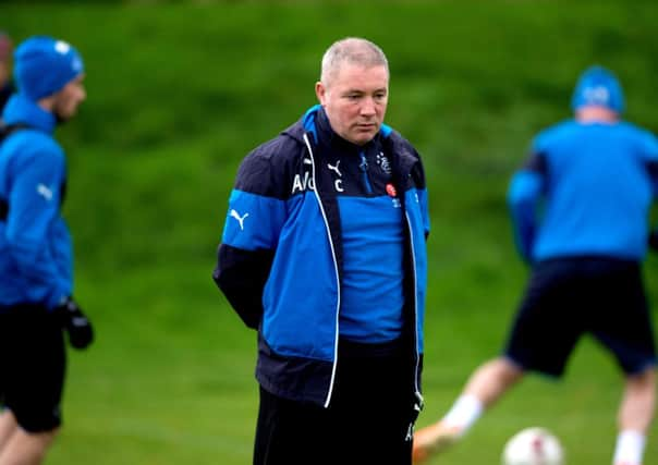 Rangers manager Ally McCoist has been told his job is safe for the forseeable future. Picture: SNS