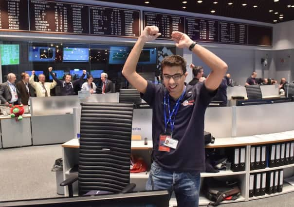 The Rosetta mission crew celebrates Philae successfully landing on comet 67P. Picture: Getty