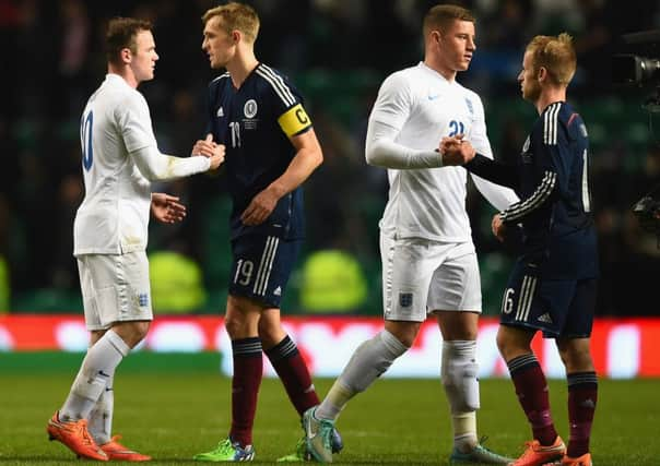 Wayne Rooney, Darren Fletcher, Barry Bannan and Ross Barkley after the game. Picture: Getty