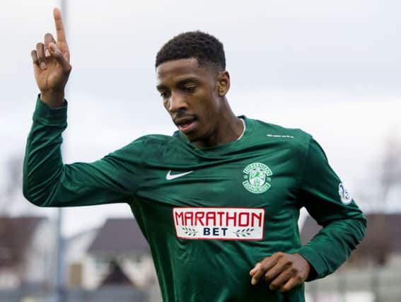 Dominique Malonga celebrates scoring Hibs second goal in the win over Dumbarton 
on Saturday. Picture: SNS