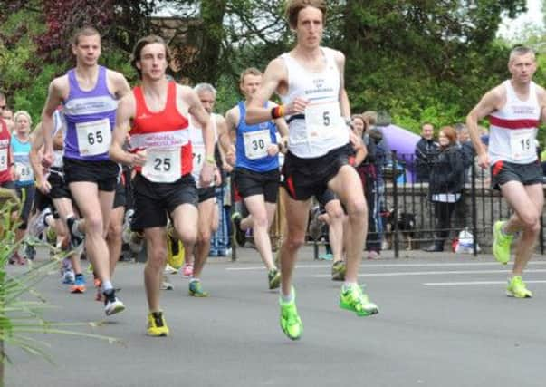 Entrants, like those pictured, complained that the course was 'too long', forcing organisers to re-check their measurements. Picture: TSPL