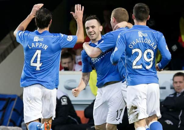 James McFadden, centre, is congratulated after his goal made it 2-0 to the hosts. Picture: Kenny Smith