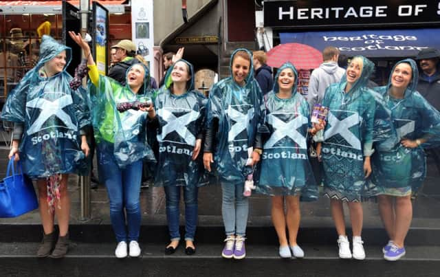 Tourists flock to Scotland despite the weather, rather than because of it. Picture: Jane Barlow