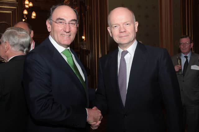 Lord Trimble photobombs Ignacio Galan and William Hague