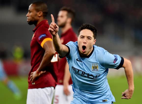 Samir Nasri celebrates giving City the lead in Rome. Picture: Getty