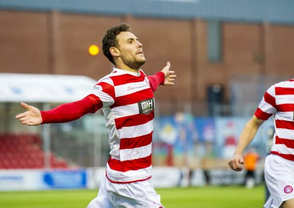 Hamilton's Tony Andreu (left) celebrates having put his side 1-0 ahead. Picture: SNS