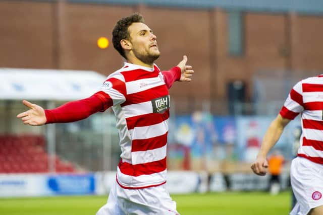 Hamilton's Tony Andreu (left) celebrates having put his side 1-0 ahead. Picture: SNS