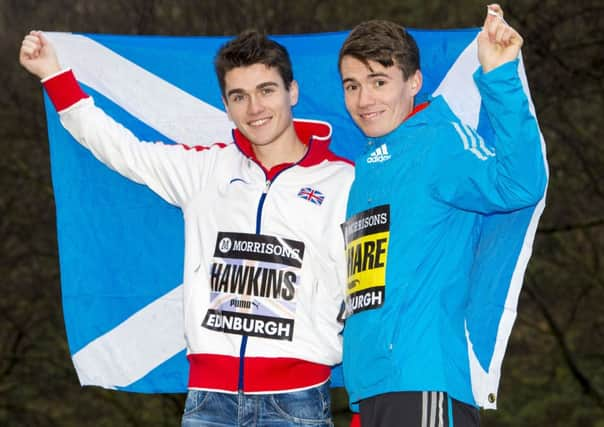 Callum Hawkins, left, and Chris OHare meet up yesterday ahead of the Great Edinburgh XC. Picture: PA