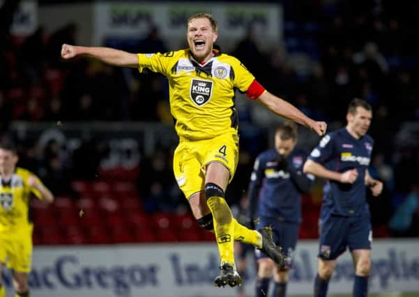 St Mirren's Marc McAusland (centre) celebrates after his side defeat Ross County. Picture: SNS Group