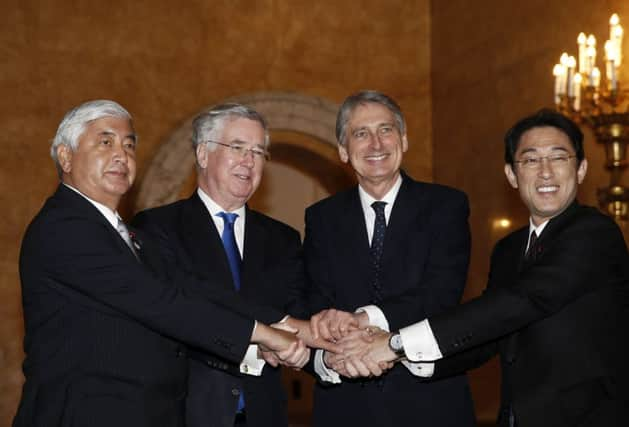 Defence Secretary Michael Fallon and Foreign Secretary Philip Hammond with Japans Gen Nakatani, left, and Fumio Kishida. Picture: Contributed