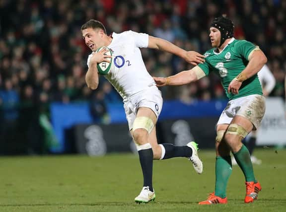 Sam Burgess eludes Irelands Sean OBrien but the Bath man was largely a peripheral figure. Picture: PA