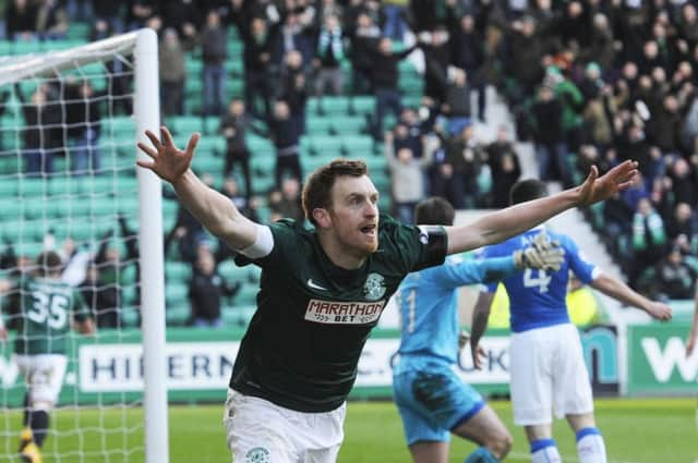 Liam Craig celebrates scoring Hibs' fourth against Rangers. Picture: Greg Macvean