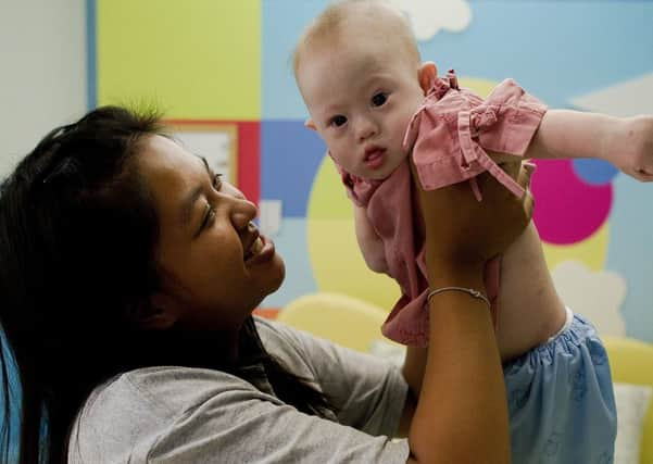 Surrogate mum Pattaramon Chanbua with baby Gammy. Picture: AFP