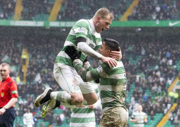 John Guidetti, celebrating scoring against Hamilton, has leapt back into Ronny Deila's plans. Picture: PA