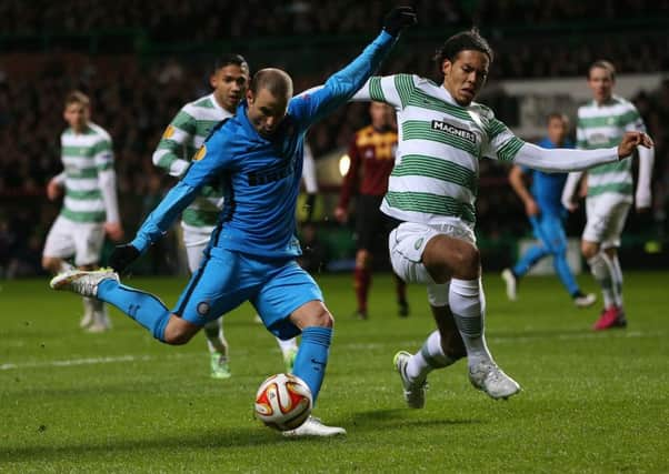 Virgil van Dijk challenges Inter Milan's Rodrigo Palacio. Picture: AP