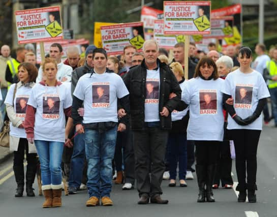 Alan McLean (centre) during a protest march in Burntisland. Picture: Robert Perry