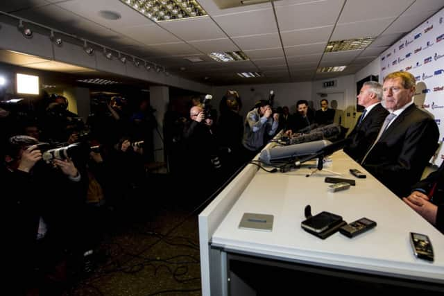 Prospective Rangers chairman Dave King addresses the media at Ibrox with Paul Murray, left, and John Gilligan. Picture: SNS