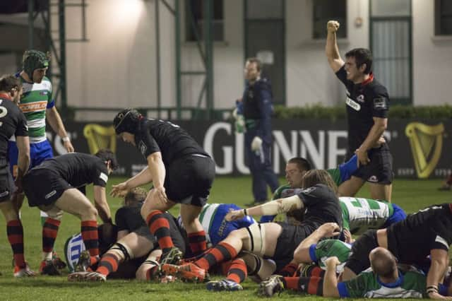 Sam Hidalgo-Clyne, right, celebrates a try. Picture: Marco Sartori