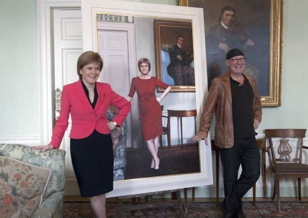 First Minister Nicola Sturgeon gets a look at her life-size portrait by artist Gerard M Burns at Bute House, Edinburgh. Picture: Jane Barlow