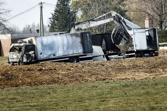 Buried-out vehicles left by the jewel robbers on the A6 motorway which connects Paris and Lyon. Picture: AFP/Getty