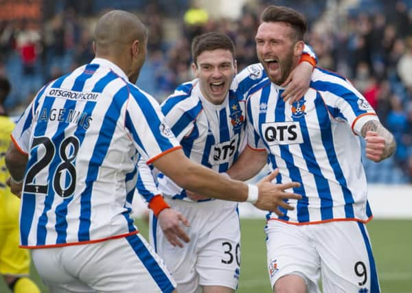 Lee Miller celebrates scoring the winning goal. Picture: SNS